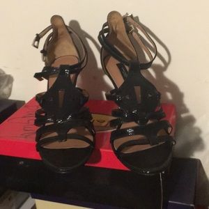 Elegant leather shoes strap up around the ankle